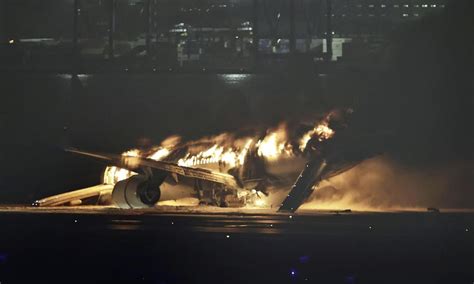 Planes collide and catch fire at Japan’s busy Haneda airport, killing 5. Hundreds evacuated safely